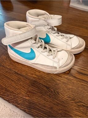 Nike Kids High-Top Sneakers in White with Teal Swoosh